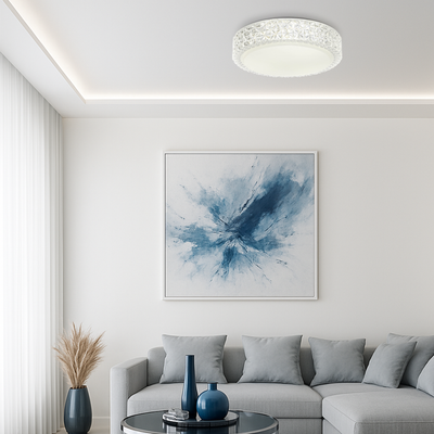 Modern living room with abstract blue artwork on the wall, gray sofa, and decorative elements, from Australia's leading wholesale lighting supplier.